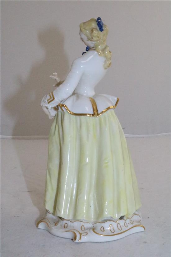 A Nymphenburg porcelain figure of Julia, after the Komedia Del arte figure by Bustelli, 20th century, 8.25in.